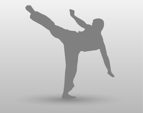 Of Karate Man With Leg Up Clipart