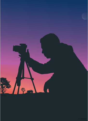 Cameraman In Sunset Clipart
